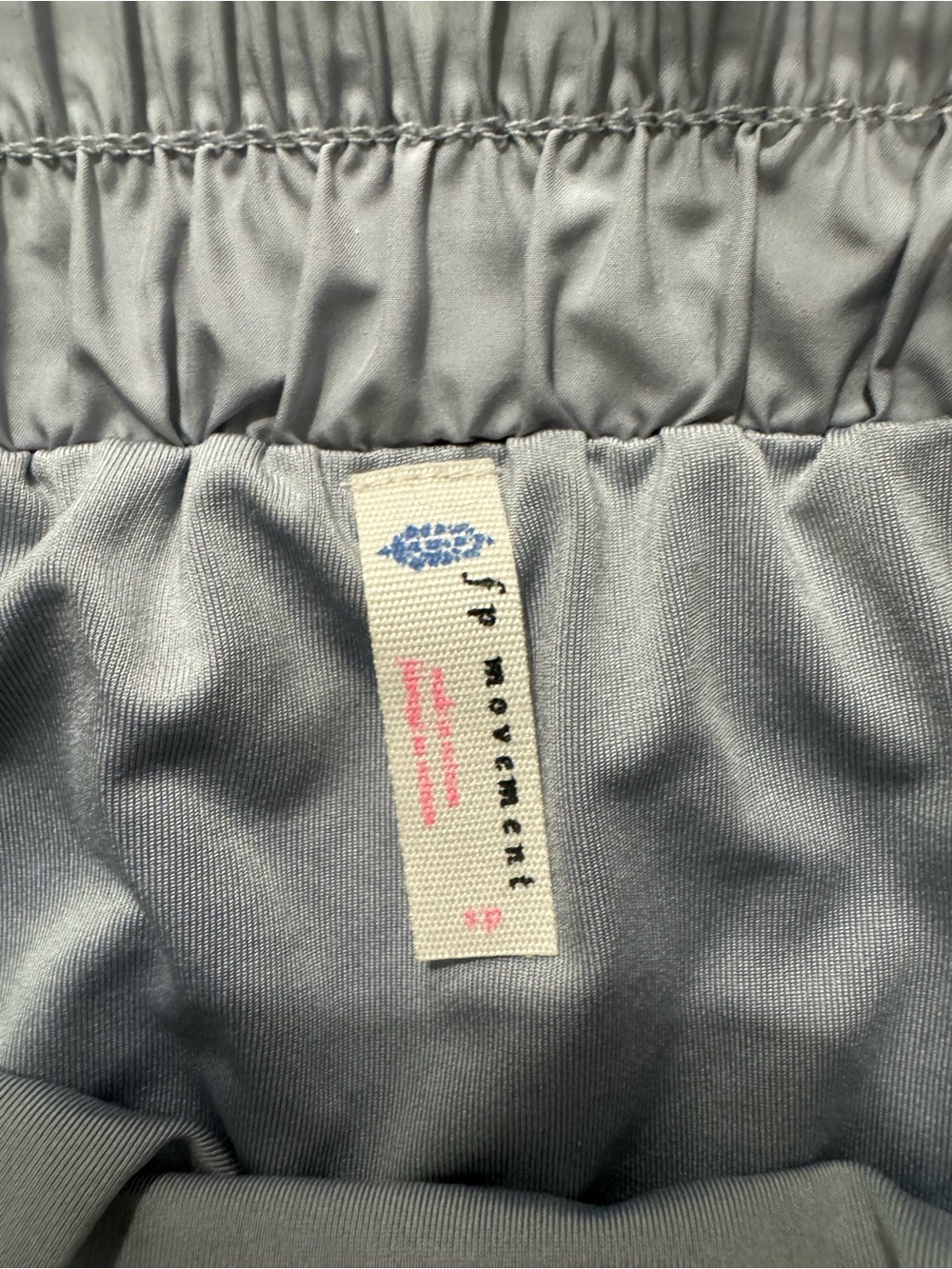 FP Movement Get Your Flirt On Ruffle Running Shorts Gray SP - Picture 8 of 8